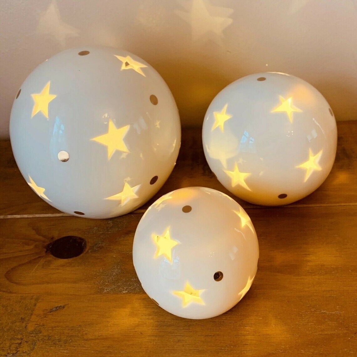 White Ceramic LED Cut Out Star Design Warm White Light Up Ball Globe Decor